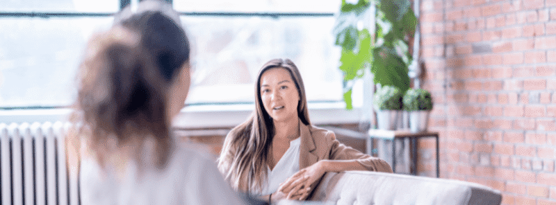 woman speaking in therapy session